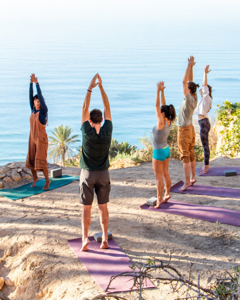 Yoga for a small group on the cliffs in Imsouane